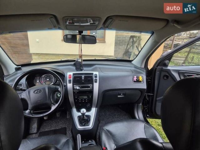 Чорний Хендай Туксон, об'ємом двигуна 1.99 л та пробігом 181 тис. км за 8150 $, фото 10 на Automoto.ua