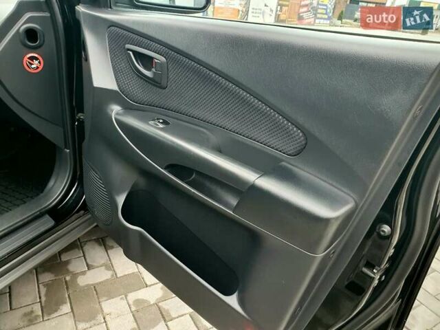 Чорний Хендай Туксон, об'ємом двигуна 2 л та пробігом 225 тис. км за 8000 $, фото 36 на Automoto.ua