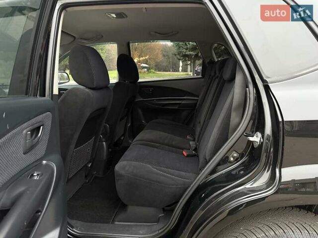 Черный Хендай Туксон, объемом двигателя 1.99 л и пробегом 240 тыс. км за 7200 $, фото 41 на Automoto.ua