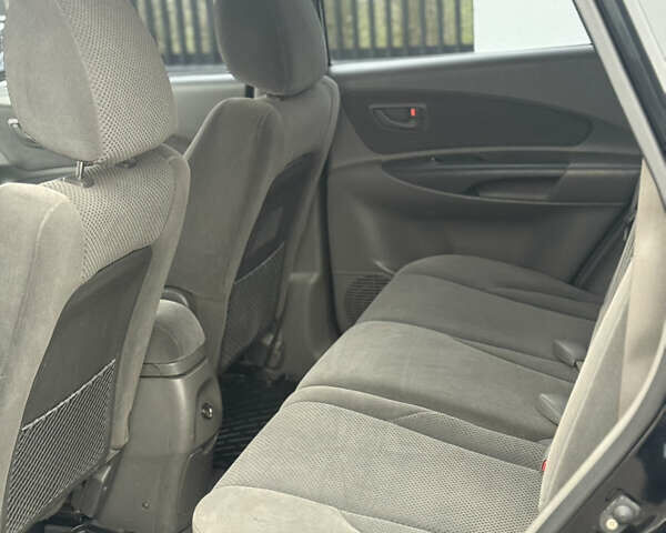 Чорний Хендай Туксон, об'ємом двигуна 2 л та пробігом 107 тис. км за 8500 $, фото 17 на Automoto.ua