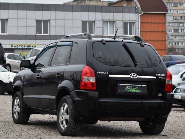 Чорний Хендай Туксон, об'ємом двигуна 2 л та пробігом 204 тис. км за 8650 $, фото 3 на Automoto.ua
