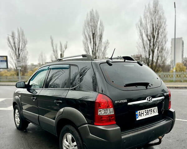 Чорний Хендай Туксон, об'ємом двигуна 1.98 л та пробігом 238 тис. км за 8499 $, фото 11 на Automoto.ua