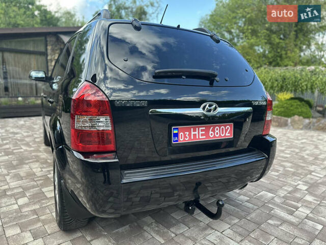 Черный Хендай Туксон, объемом двигателя 2 л и пробегом 218 тыс. км за 8700 $, фото 16 на Automoto.ua