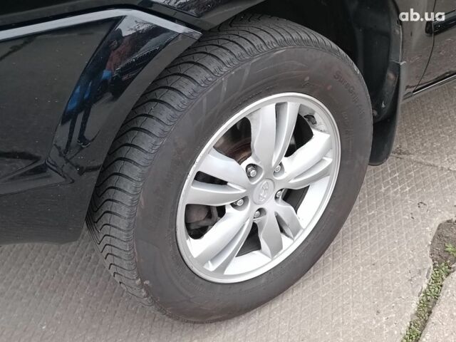 Чорний Хендай Туксон, об'ємом двигуна 2 л та пробігом 192 тис. км за 7990 $, фото 5 на Automoto.ua