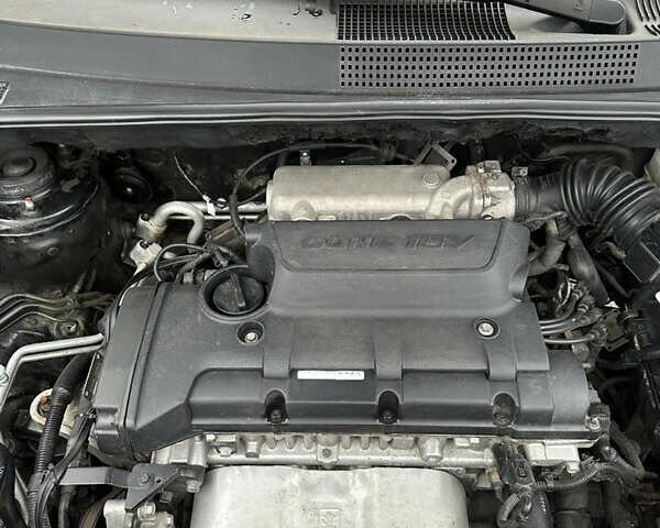 Черный Хендай Туксон, объемом двигателя 2 л и пробегом 136 тыс. км за 8500 $, фото 35 на Automoto.ua