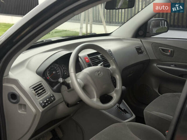 Чорний Хендай Туксон, об'ємом двигуна 2 л та пробігом 107 тис. км за 8500 $, фото 18 на Automoto.ua