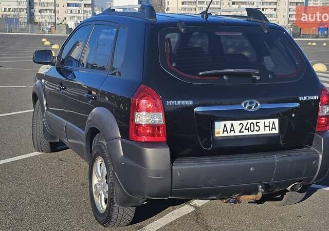 Чорний Хендай Туксон, об'ємом двигуна 1.98 л та пробігом 212 тис. км за 7766 $, фото 2 на Automoto.ua