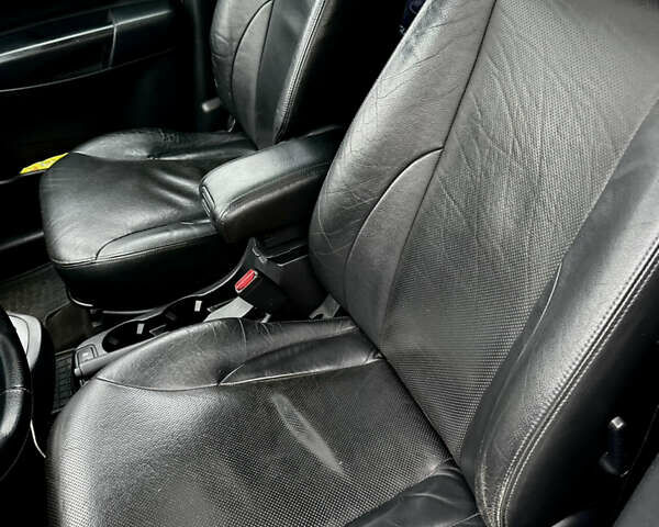 Чорний Хендай Туксон, об'ємом двигуна 1.98 л та пробігом 238 тис. км за 8499 $, фото 15 на Automoto.ua