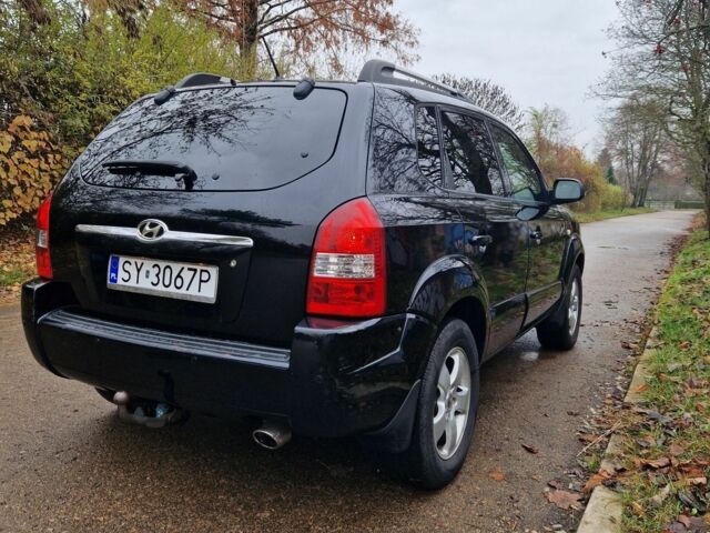 Черный Хендай Туксон, объемом двигателя 2 л и пробегом 190 тыс. км за 1843 $, фото 3 на Automoto.ua