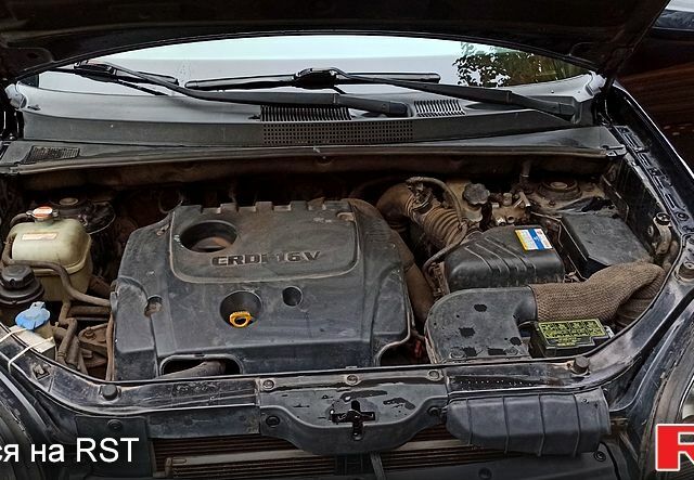 Чорний Хендай Туксон, об'ємом двигуна 2 л та пробігом 188 тис. км за 8800 $, фото 13 на Automoto.ua