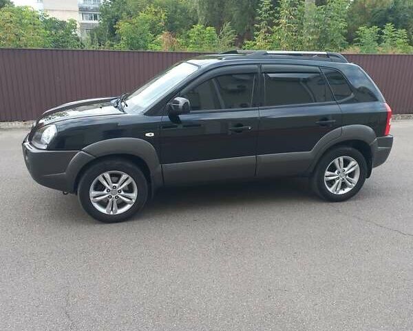 Черный Хендай Туксон, объемом двигателя 2 л и пробегом 168 тыс. км за 9000 $, фото 12 на Automoto.ua