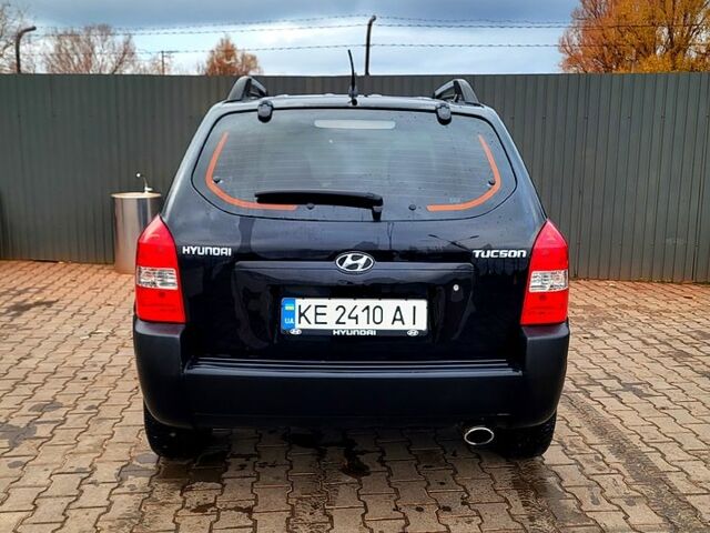 Черный Хендай Туксон, объемом двигателя 2 л и пробегом 223 тыс. км за 7500 $, фото 11 на Automoto.ua