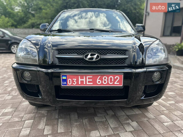 Черный Хендай Туксон, объемом двигателя 2 л и пробегом 218 тыс. км за 8700 $, фото 3 на Automoto.ua