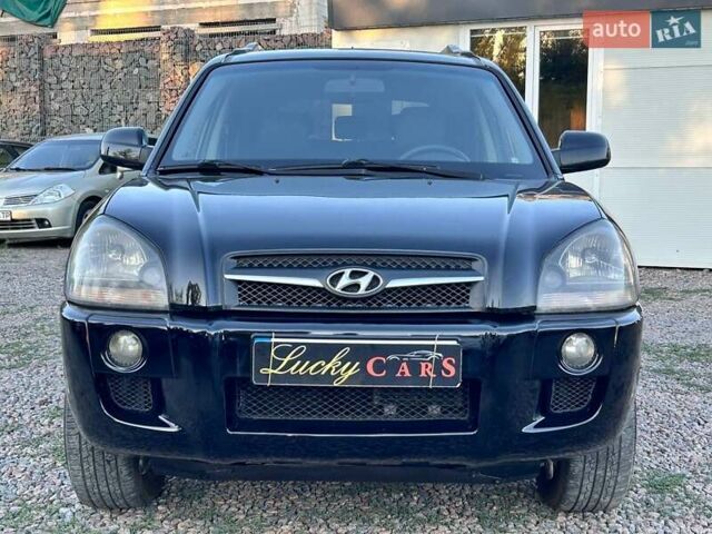 Черный Хендай Туксон, объемом двигателя 2 л и пробегом 230 тыс. км за 7500 $, фото 1 на Automoto.ua