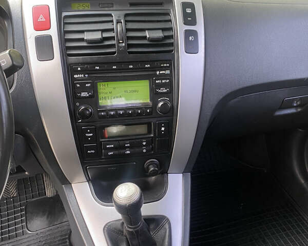 Чорний Хендай Туксон, об'ємом двигуна 2 л та пробігом 160 тис. км за 8800 $, фото 8 на Automoto.ua
