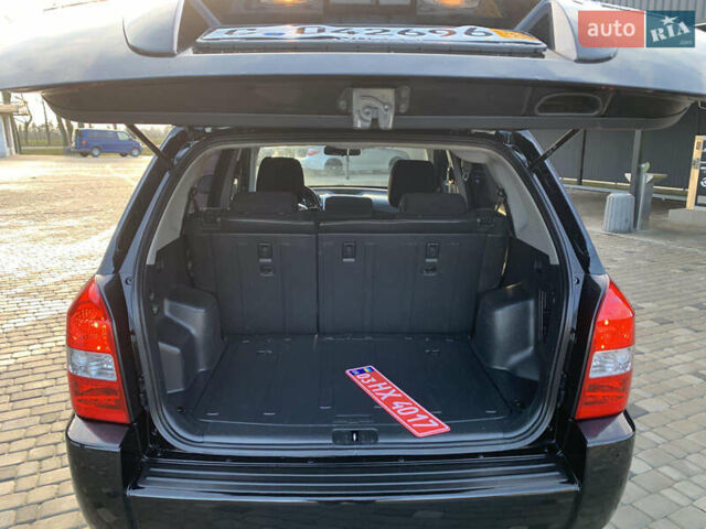 Черный Хендай Туксон, объемом двигателя 2 л и пробегом 212 тыс. км за 7600 $, фото 8 на Automoto.ua