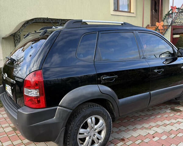 Чорний Хендай Туксон, об'ємом двигуна 2 л та пробігом 314 тис. км за 7000 $, фото 13 на Automoto.ua