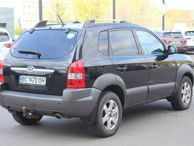 Черный Хендай Туксон, объемом двигателя 2 л и пробегом 210 тыс. км за 8999 $, фото 5 на Automoto.ua