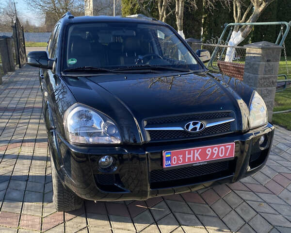 Черный Хендай Туксон, объемом двигателя 2 л и пробегом 149 тыс. км за 8250 $, фото 1 на Automoto.ua