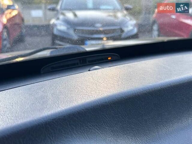 Черный Хендай Туксон, объемом двигателя 2 л и пробегом 230 тыс. км за 7500 $, фото 23 на Automoto.ua