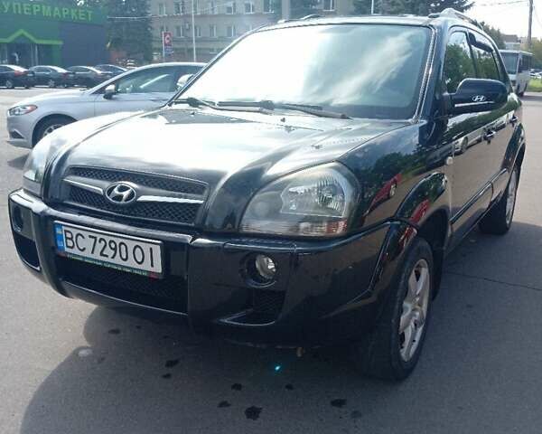Черный Хендай Туксон, объемом двигателя 1.98 л и пробегом 195 тыс. км за 6981 $, фото 3 на Automoto.ua