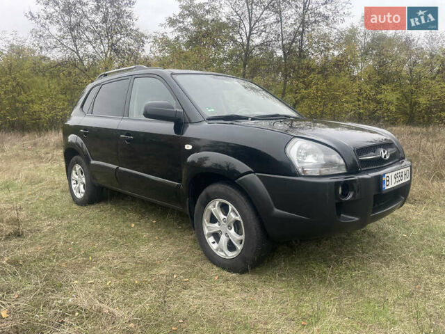Хендай Туксон 2008 у Лубнах на Automoto.ua Чорний Хендай Туксон, об'ємом двигуна 1.98 л та пробігом 235 тис. км за 6999 $, фото 2 на Automoto.ua