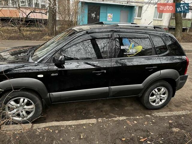 Чорний Хендай Туксон, об'ємом двигуна 1.98 л та пробігом 177 тис. км за 8500 $, фото 3 на Automoto.ua