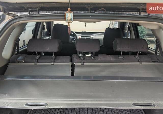 Черный Хендай Туксон, объемом двигателя 2 л и пробегом 163 тыс. км за 8100 $, фото 17 на Automoto.ua