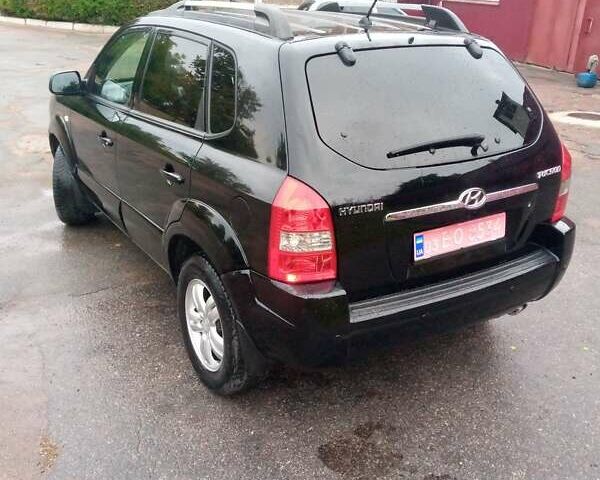 Чорний Хендай Туксон, об'ємом двигуна 2 л та пробігом 225 тис. км за 7850 $, фото 8 на Automoto.ua