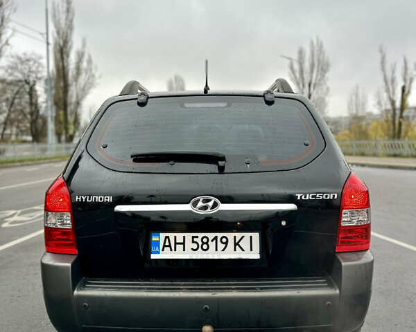 Чорний Хендай Туксон, об'ємом двигуна 1.98 л та пробігом 238 тис. км за 8499 $, фото 14 на Automoto.ua