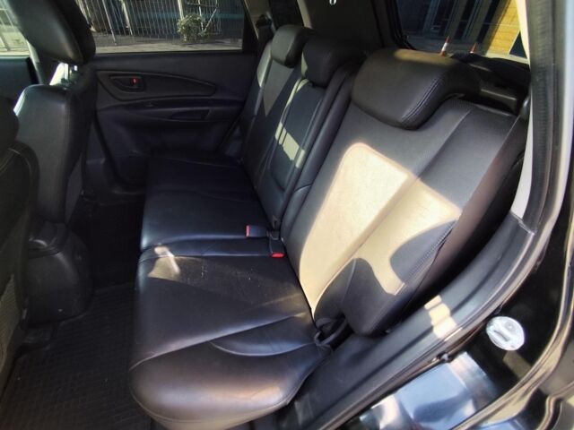 Черный Хендай Туксон, объемом двигателя 2 л и пробегом 82 тыс. км за 7490 $, фото 25 на Automoto.ua