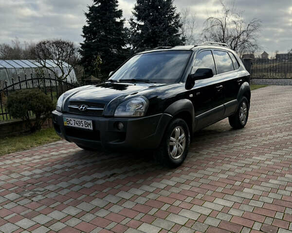 Чорний Хендай Туксон, об'ємом двигуна 2 л та пробігом 314 тис. км за 7000 $, фото 3 на Automoto.ua