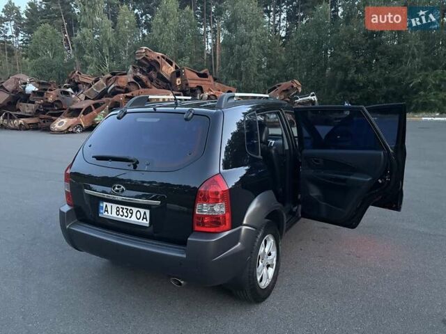 Чорний Хендай Туксон, об'ємом двигуна 1.98 л та пробігом 273 тис. км за 10000 $, фото 15 на Automoto.ua