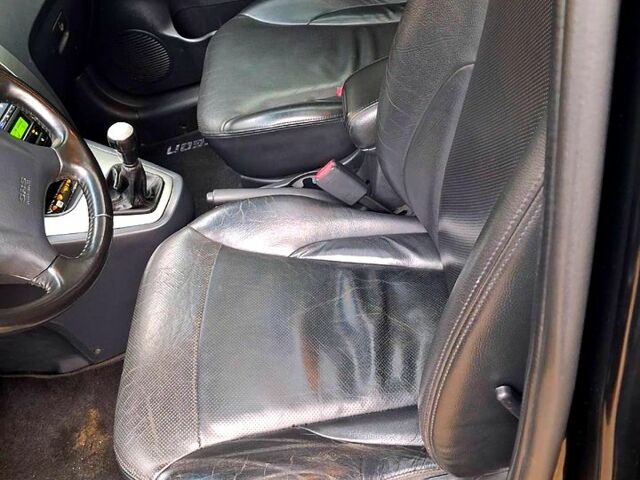 Чорний Хендай Туксон, об'ємом двигуна 2 л та пробігом 208 тис. км за 7500 $, фото 4 на Automoto.ua