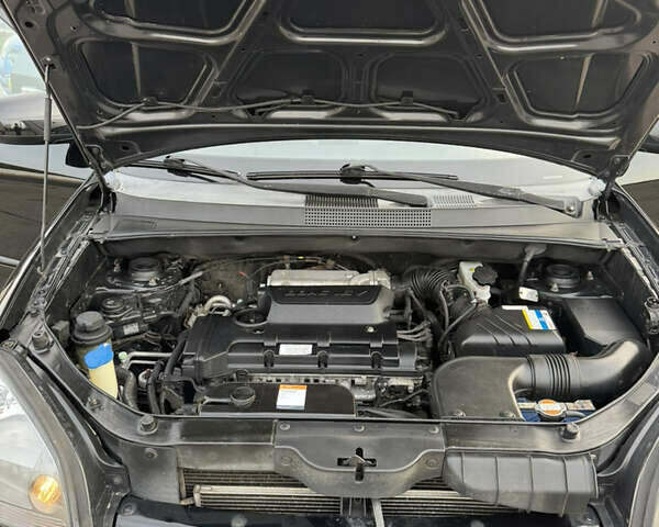 Черный Хендай Туксон, объемом двигателя 2 л и пробегом 210 тыс. км за 7850 $, фото 39 на Automoto.ua