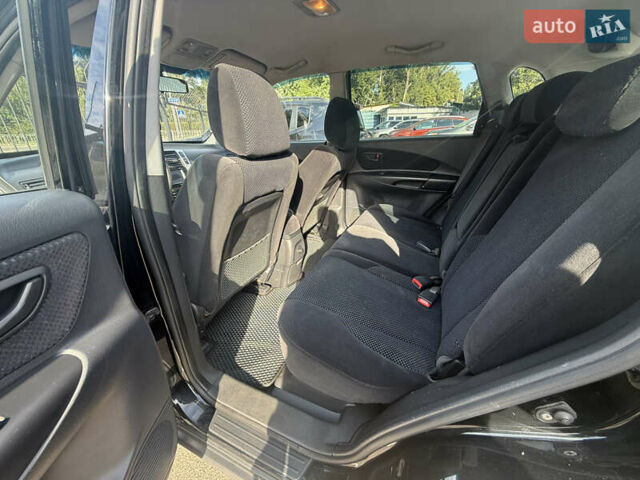 Черный Хендай Туксон, объемом двигателя 2 л и пробегом 218 тыс. км за 6700 $, фото 9 на Automoto.ua