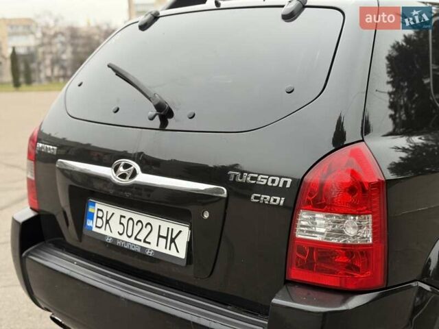 Черный Хендай Туксон, объемом двигателя 1.99 л и пробегом 240 тыс. км за 7200 $, фото 22 на Automoto.ua