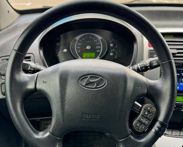 Черный Хендай Туксон, объемом двигателя 1.98 л и пробегом 202 тыс. км за 8350 $, фото 16 на Automoto.ua