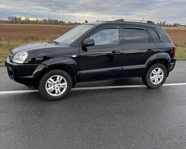 Черный Хендай Туксон, объемом двигателя 2 л и пробегом 253 тыс. км за 8299 $, фото 20 на Automoto.ua