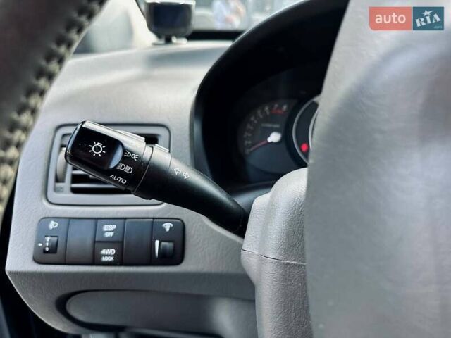 Черный Хендай Туксон, объемом двигателя 1.98 л и пробегом 206 тыс. км за 8300 $, фото 3 на Automoto.ua