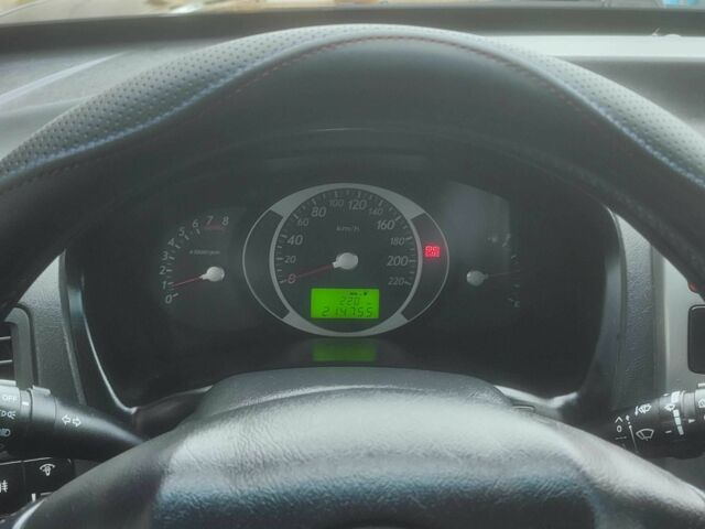 Чорний Хендай Туксон, об'ємом двигуна 2 л та пробігом 214 тис. км за 6000 $, фото 5 на Automoto.ua