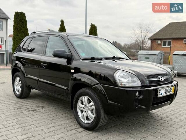 Черный Хендай Туксон, объемом двигателя 1.98 л и пробегом 239 тыс. км за 8700 $, фото 7 на Automoto.ua