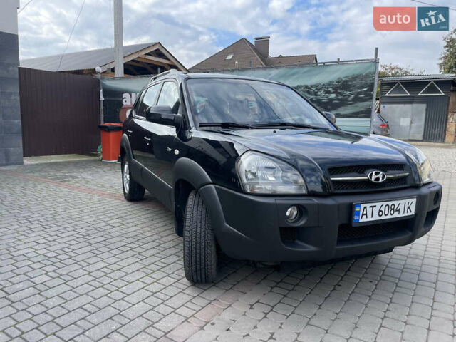 Черный Хендай Туксон, объемом двигателя 1.98 л и пробегом 177 тыс. км за 7600 $, фото 3 на Automoto.ua
