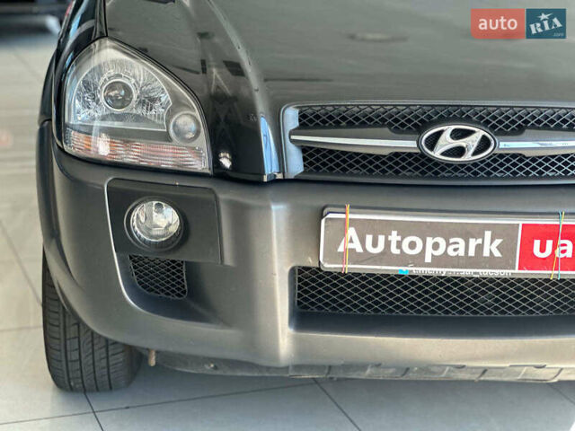 Черный Хендай Туксон, объемом двигателя 2.7 л и пробегом 158 тыс. км за 7940 $, фото 5 на Automoto.ua