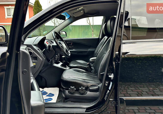 Чорний Хендай Туксон, об'ємом двигуна 2 л та пробігом 182 тис. км за 8299 $, фото 48 на Automoto.ua