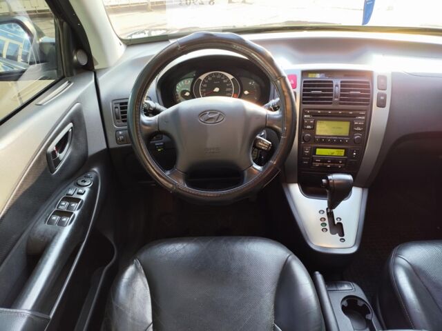 Черный Хендай Туксон, объемом двигателя 2 л и пробегом 82 тыс. км за 7490 $, фото 27 на Automoto.ua