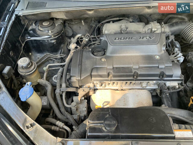 Черный Хендай Туксон, объемом двигателя 1.98 л и пробегом 260 тыс. км за 7777 $, фото 17 на Automoto.ua