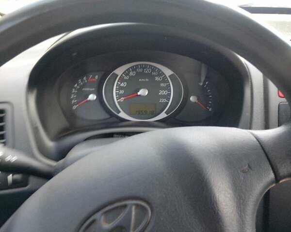 Черный Хендай Туксон, объемом двигателя 1.98 л и пробегом 195 тыс. км за 6981 $, фото 12 на Automoto.ua