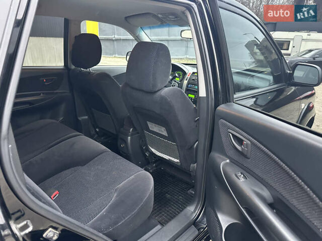 Чорний Хендай Туксон, об'ємом двигуна 2 л та пробігом 243 тис. км за 7999 $, фото 28 на Automoto.ua