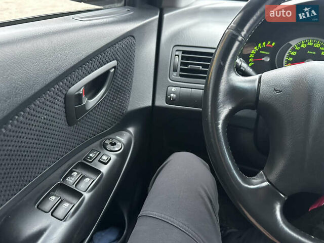 Чорний Хендай Туксон, об'ємом двигуна 2 л та пробігом 243 тис. км за 7999 $, фото 36 на Automoto.ua